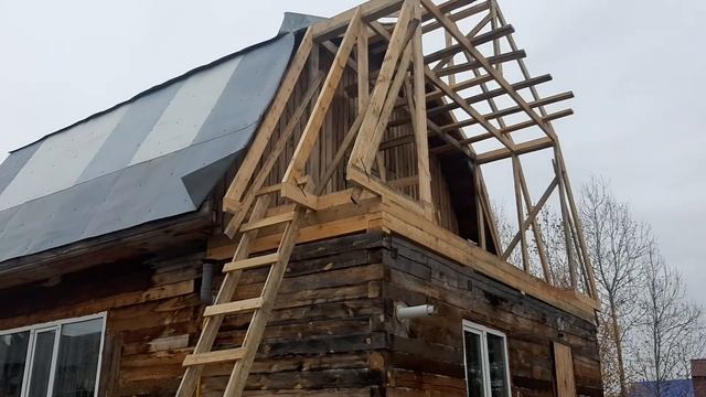 Пристрой под общую кровлю дома.
