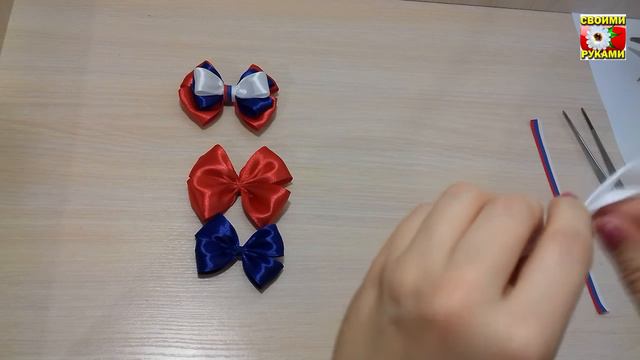 Заколка для волос с бантом триколор