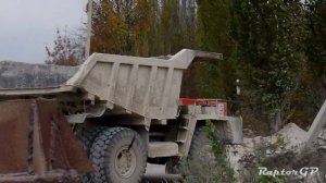 BELAZ-7522 are crossing a highway. БелАЗы-7522 пересекают шоссе