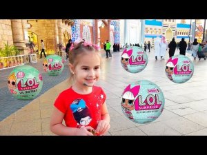 Куклы ЛОЛ открываем в парке развлечений Челлендж для Алины и Юли LOL Challenge Entertaiment for kid