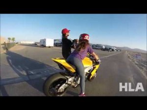 GIRL LEARNS TO RIDE A SUPERBIKE AT THE RACE TRACK! HOW TO RIDE.mp4