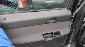 How to remove Volvo v50 rear door panel