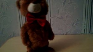 Игрушка танцующий медведь.