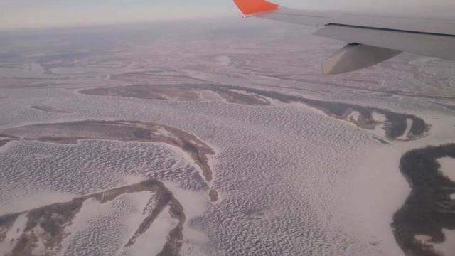 Полет над Энгельсом и Волгой к Саратову зимой.
