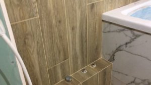 # Ванная комната в керамограните формата 200х900 и 450х900