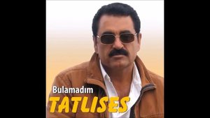 İbrahim Tatlıses-Eşarbını Yan Bağlama