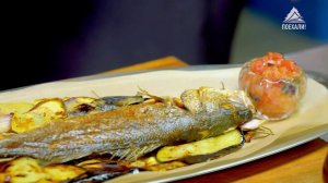 Сибас, запечённый с овощами