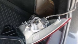 Как снять задние фонари Замена лампочки стоп сигнала Opel Astra J