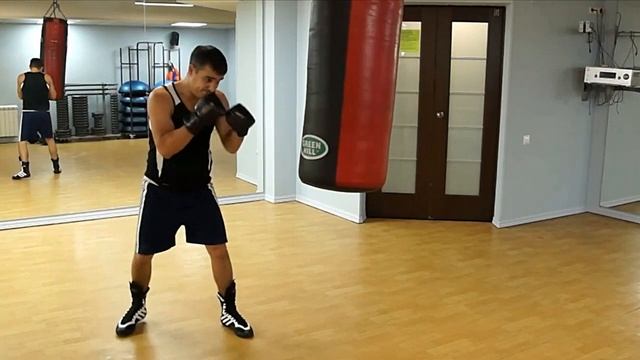 Уроки бокса. Тренировка на боксёрском мешке