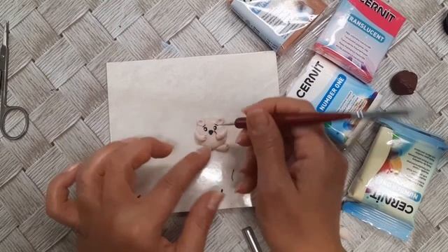 Ёжик из полимерной запекаемой глины.