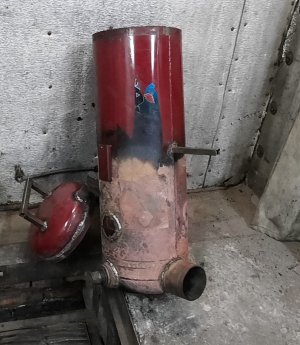 Вертикальная печь с верхней подачей из газового баллона.