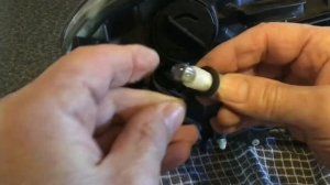 Volvo XC60 Guide to removing headlamp and replacing the bulbs.