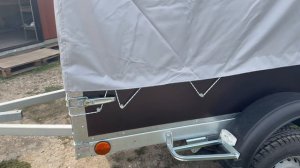 Прицеп Крепыш 2.0 тентом и ступенями бамперами