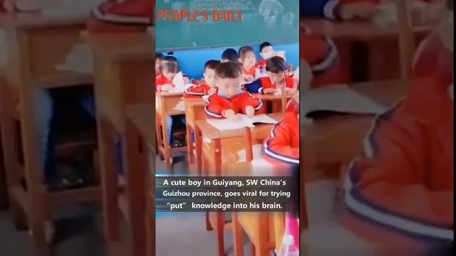 Cute Chinese boy goes viral for trying to “put” knowledge into his brain