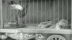 Charlie Chaplin (The lion cage)