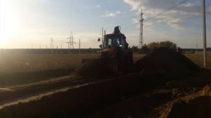 Экскаватор-погрузчик Fiat-Kobelco FB100.2 (New Holland B110)