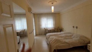 Турция недвижимость в Алании 3 комнатная 100 м² в хорошей локации с ВНЖ в районе Тосмур Аланья 2+1