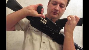 Защелка интегрированная с воронкой шахты магазина для автомата Калашникова