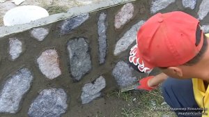 Кладка бутового камня.Зачистка швов.