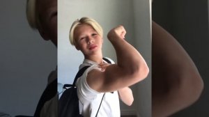 13 years old bodybuilder flexing muscle