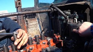 Пельмень завел трактор после ремонта/Dumpling started up a tractor after repair