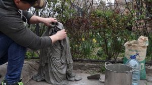 Faceless Monk Statue From Old Clothes And Cement