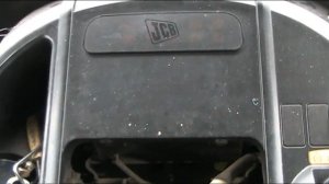 JCB 3CX Снимаем переднюю панель.JCB 3CX Removing the front panel