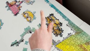 Halfway through the 9000 Piece Minions Puzzle (My biggest puzzle yet!)