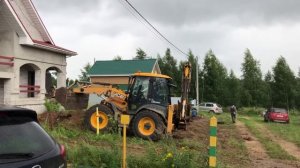 Планировка Экскаватором погрузчиком на участке