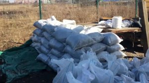 Фасовка земли плодородной в мешки по 50кг