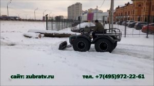 Вездеход ZUBR 4x4 чистит снег