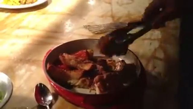 Plating up roast porchetta at Giuseppe Arnaldo & Sons