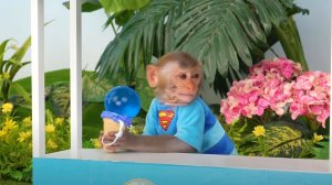 Monkey Baby Bon Bon meets rain of chocolate candy and eats rainbow milk bottle jelly with ducks