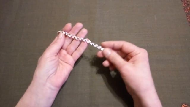 Обзор позолоченного браслета с кристаллами кубического циркония (фианитами) из Китая смотреть онлайн