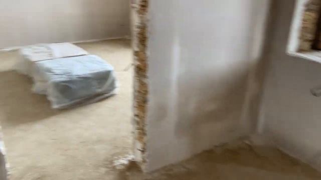 Штукатурка стен из ракушечника в жилом доме.