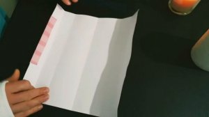 как упаковать подарок цилиндрической формы.