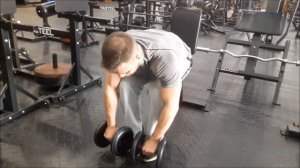 Разведение гантелей сидя в наклоне