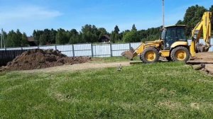 Планировка учатка трактором KOMATSU