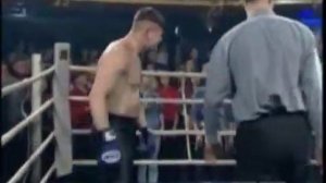 A crazy fighter with strange "hair" attacks to referee