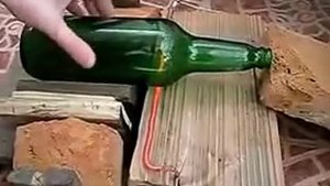 Как разрезать стеклянную бутылку . Китайский метод.