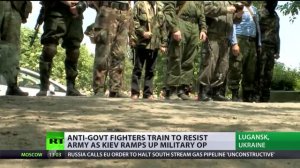 'It's not becoming a war, it IS a war' RT visits E Ukraine anti govt fighter training camp (1)