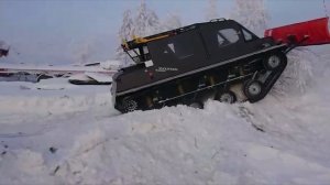 Снегоуборочный отвал от ООО "Уникар" на вездеходе в условиях Крайнего Севера