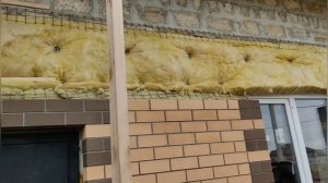 Консервация незаконченной облицовочной кирпичной кладки жилого  дома на зиму