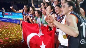 Eczacibasi players singing with medals