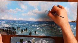Красивое видео, как художник мастихином и масляными красками пишет море.