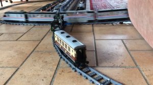 LEGO Emerald Night 10194 and Metroliner 4558 on long curves with small crashes