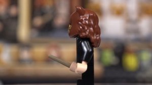 Лего Хогвартс Ошибка с оборотным зельем LEGO Гарри Поттер 76386 Золотая минифигурка и Гермиона Кошк