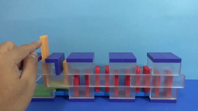 Dominoes Descend Down This Wall! | Downwall Domino Trick Tutorial