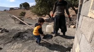 nomadic life; Sajjad's family and construction of toilet and cooking eggplant stew by mother