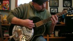 Playing an Acoustic Fender Resonator Guitar and Glass Slide